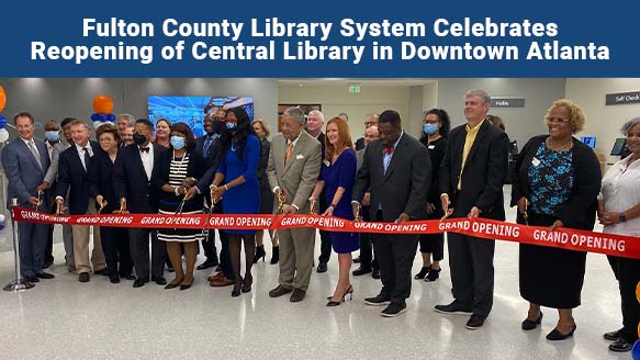 a photo featuring the celebration of Fulton County Library system celebrating the reopening of central library in downtown Atlanta