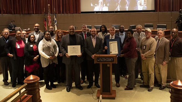 Public Works team holding Proclamation